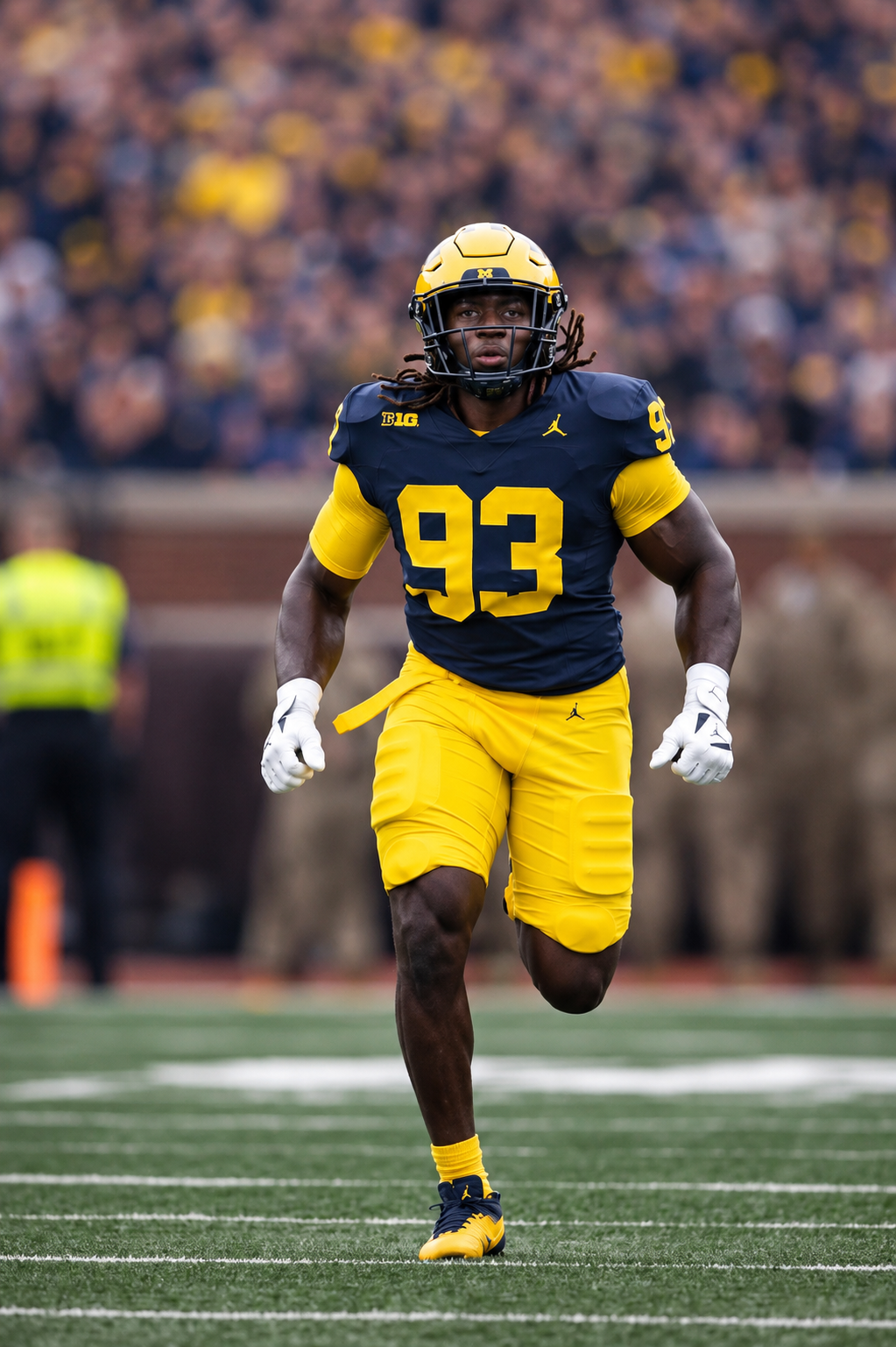 Benny Patterson III running on the football field